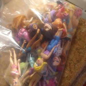 Vintage Polly pocket dolls and clothes